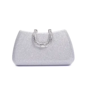 Silver rhinestone evening clutch bag detail, sparkling sequin clutch for party dress.