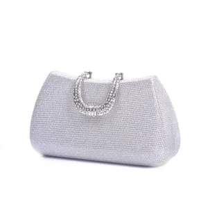 Silver rhinestone evening clutch detail shot, sparkling sequin texture and elegant crystal handle.