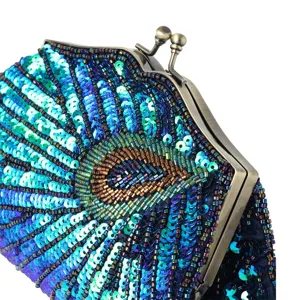 Exquisite vintage sequin peacock beaded evening clutch bag detail view, elegant retro style.