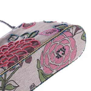 Ethnic style beaded linen evening handbag, exquisite floral embroidery detail, elegant clutch.