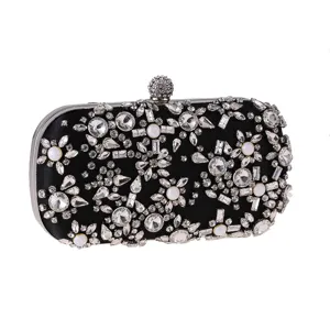 Stunning black satin evening clutch bag embellished with dazzling rhinestones and pearls.
