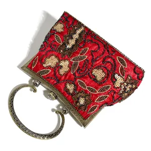 Vintage red sequin evening bag beaded clutch purse with retro metal round handle.