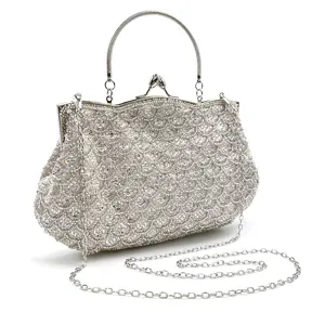Exquisite beaded evening bag detail, sparkling fish scale embroidery, metallic frame and chain.