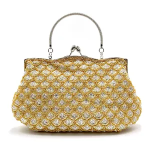 Gold beaded evening bag fish scale detail metal handle clasp closure accessory design.