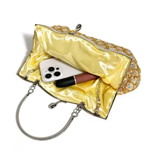 Gold beaded evening clutch bag detail showing interior capacity with phone and lipstick slots.