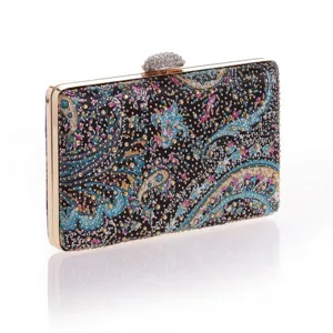 Detailed view of the printed rhinestone evening clutch bag with metallic frame and gorgeous crystal clasp.