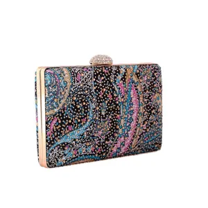 Detailed view of the exquisite printed rhinestone evening clutch bag with elegant metallic frame.