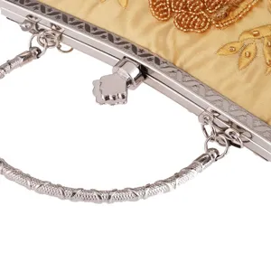 Vintage embroidered beaded evening bag banquet clutch exquisite metal frame and clasp detail.
