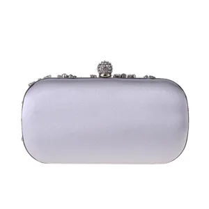 Silver satin evening clutch bag with sparkling rhinestone skull clasp for women parties