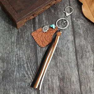 Portachiavi con nappa in pelle goffrata stile cowboy occidentale accessorio borsa donna.