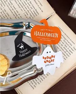 Close up detail of Halloween die-cut stickers featuring spooky ghost and pumpkin designs.