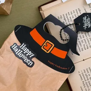 Halloween witch hat paper card packaging header detail, vintage kraft paper gift bag decor.