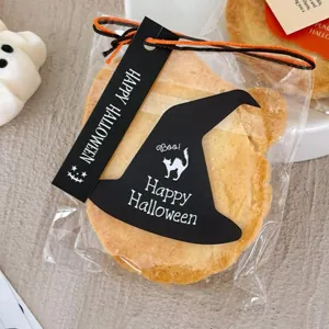 Halloween gift cookie packaging featuring cute witch hat tag and festive blessings.