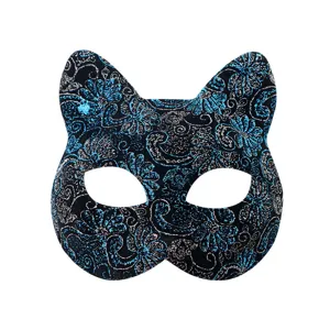 Close-up detail of the glittery blue floral pattern on the black cat masquerade mask surface.