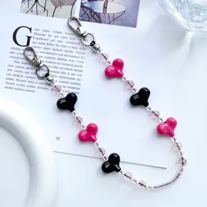 Bonito cordón para teléfono de perlas cristal corazón rosa negro colgante de bolso