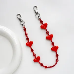 Rote Herz Kristall Perlen Tasche Anhänger und Handy Kette Detail, süßes Accessoire.
