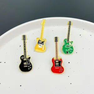 Close up of colorful electric guitar enamel pins set, alloy rock music badges for clothing backpack.