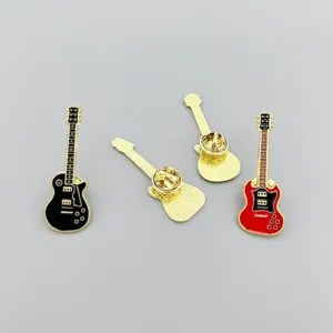 Close-up detail of creative electric guitar enamel pins, metal brooch badges for music lovers.