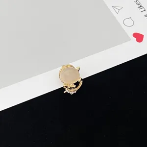 Detailed close-up view of the cute cat brooch featuring cat eye stone and sparkling rhinestones.