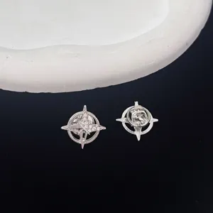 Close-up detail of the metal hexagram crystal lapel pin, showing exquisite texture and pin back.