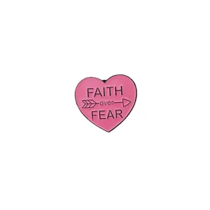 Pink heart enamel pin with FAITH over FEAR quote, cute metal badge for clothing and backpack decor.