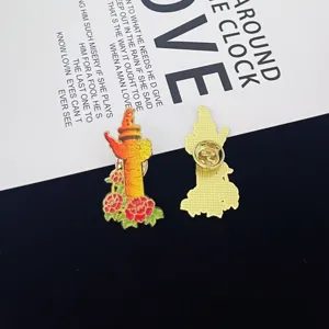 Detailed view of Chinese Huabiao pillar and peony enamel pin, showing front and back clasp.