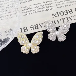 Elegant crystal butterfly brooch pin set, sparkling rhinestone pearl fashion jewelry accessories.