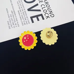 Patriotic sunflower enamel pin with red star design, stylish metal brooch badge.