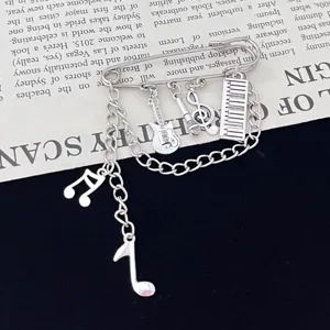 Punk music note safety pin brooch vintage silver tone fashion jewelry accessory.