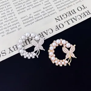 Exquisite pearl and rhinestone butterfly wreath brooch set for women sweaters and coats.