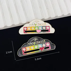 Creative metal mood tracker enamel pin detail, featuring sliding heart and cute cloud design.