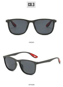 Close-up detail of trendy outdoor sports sunglasses with stylish square frame and red temples.