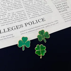 Chic green clover brooch set, fashionable alloy pins for women daily wear and gift.