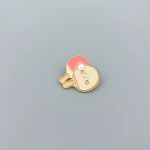 Cute sports theme enamel pin detail shot, featuring a stylish metal badge for bags and clothes.