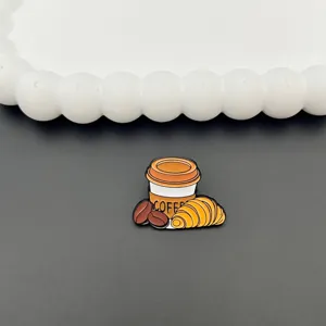 Cute cartoon coffee cup and croissant enamel pin, stylish metal brooch badge for clothing and bags.