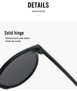 Detailed close-up of durable reinforced metal hinge on classic black sunglasses frame.
