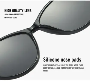 Close up view of black sunglasses featuring UV400 protection lenses and comfortable silicone nose pads.
