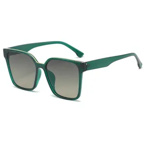 Fashion oversized square sunglasses for women, gradient lenses with green frame, chic style.