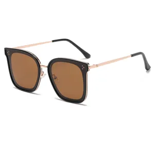 Gafas de sol cuadradas oversize para mujer y hombre, elegante montura negra con lentes marrones.