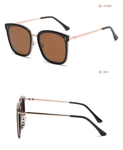Elegante quadratische Sonnenbrille mit Metallbügeln und braunen Gläsern für Damen.