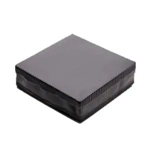Detailed view of the black microfiber glasses cleaning cloth, soft dual-side fabric texture.