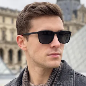 Classic black frame sunglasses for men and women, stylish outdoor UV protection eyewear.