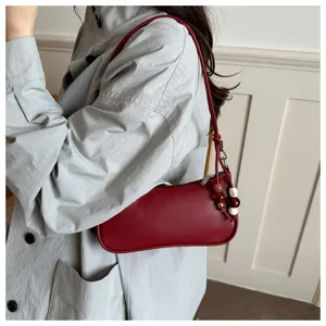 Stylish red underarm shoulder bag for women, elegant casual PU leather handbag daily use.