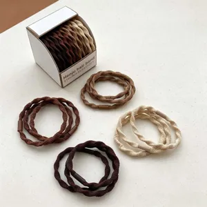 Set de gomas para el pelo elásticas sin costuras en tonos tierra con caja