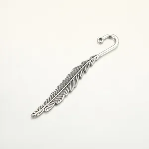 Vintage silver feather metal bookmark DIY craft accessory for handmade jewelry projects.