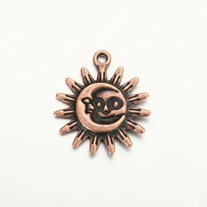 Detailed view of the vintage punk sun and moon alloy pendant charm for DIY jewelry making.