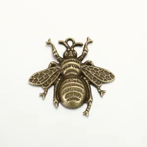 Bronze alloy bee pendant detail view, perfect DIY handmade jewelry accessory for necklaces or bracelets.