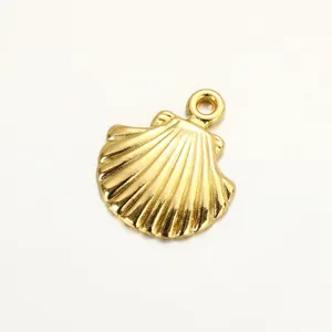 Gold seashell pendant charm close up, detailed metallic texture for DIY handmade jewelry craft.