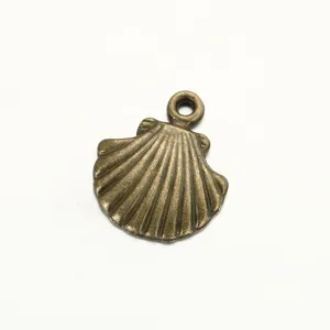 Vintage bronze shell metal charm pendant for DIY handmade jewelry necklace bracelet making.