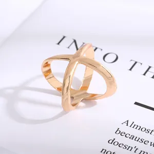 Gold cross scarf buckle and hem knot clip, premium metal accessory for women fashion styling.
